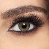 Girl wearing Green FreshLook Cosmetic Colour Contact Lenses.